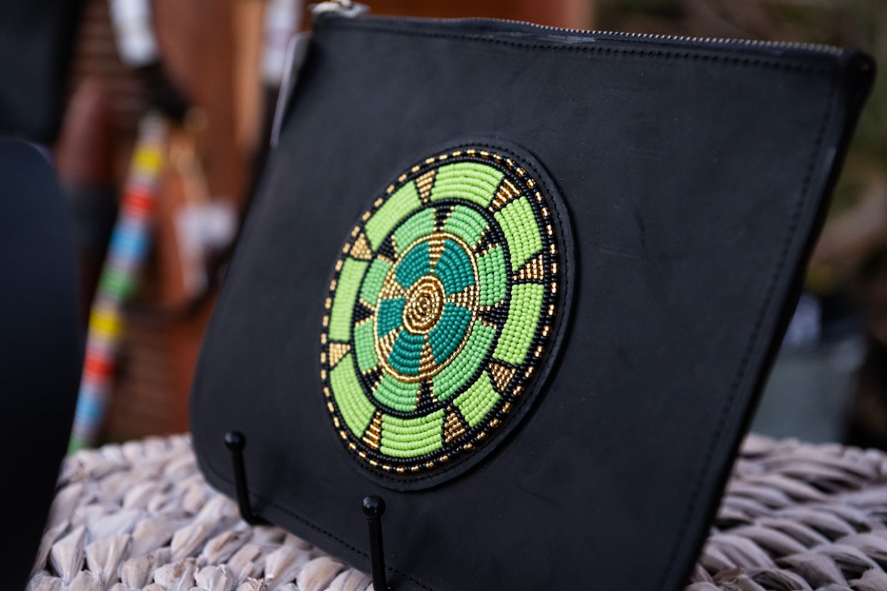 Leather laptop case with beading