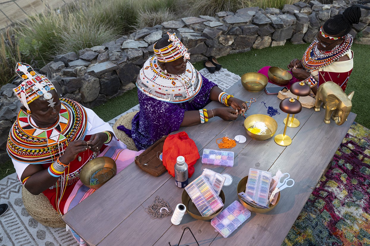 Women beading at the Safari Park