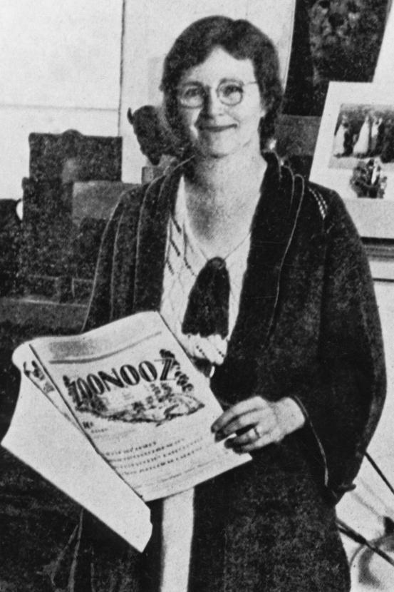 Belle Benchley with ZooNooz paper