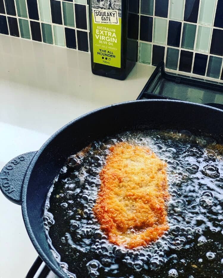 Veal parm frying in oil