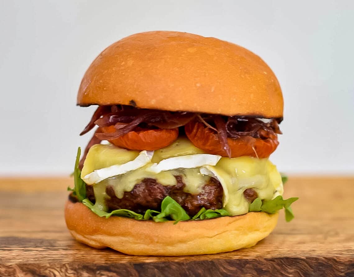 organic beef burger,brie, slo roasted tomatoes & onion marmalade