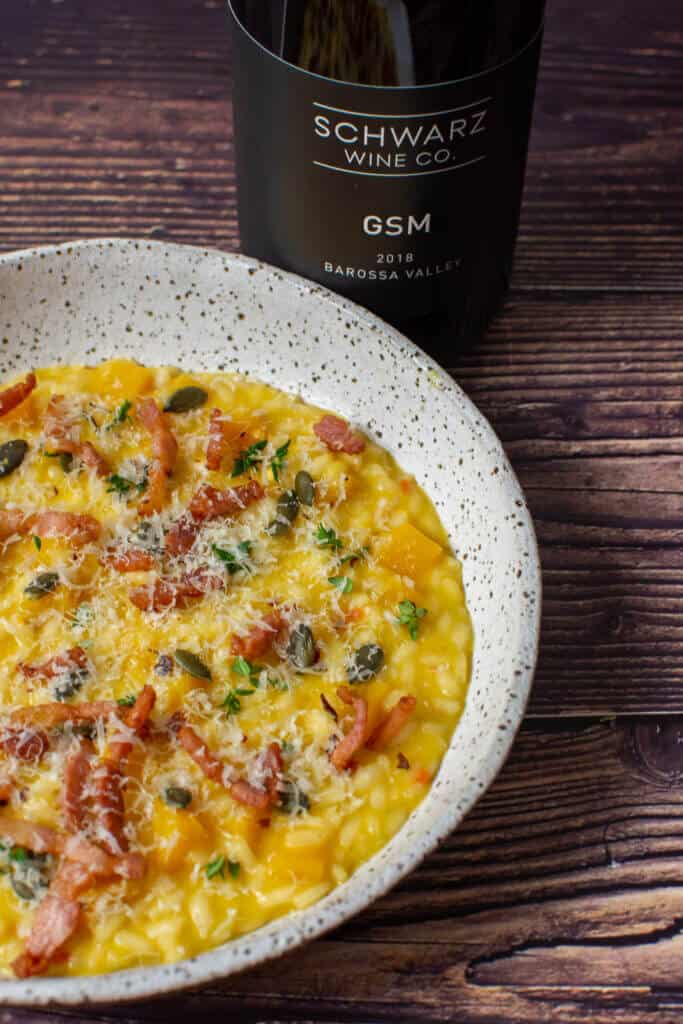 schwartz GSM wine and a bowl of pumpkin risotto
