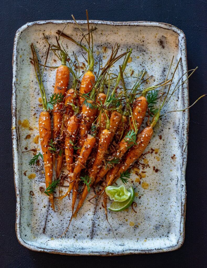 Miso Maple Carrots miso maple roased carrots on a serving platter
