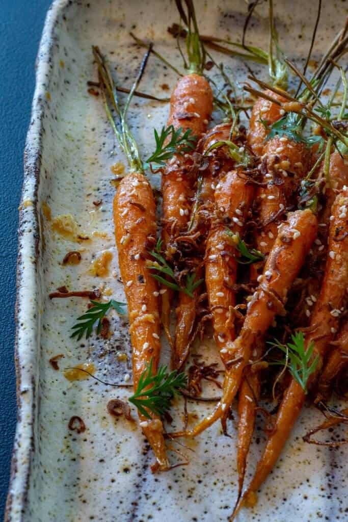 Miso Maple Carrots miso maple carrots on a white serving platter