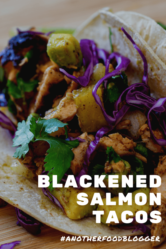 salmon, grilled pineapple, coriander & cabbage in a tortilla