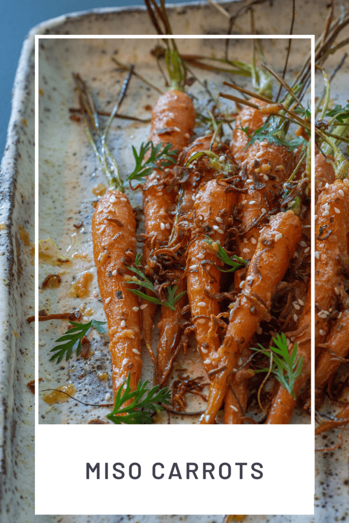 roasted miso maple carrots on a white serving plate