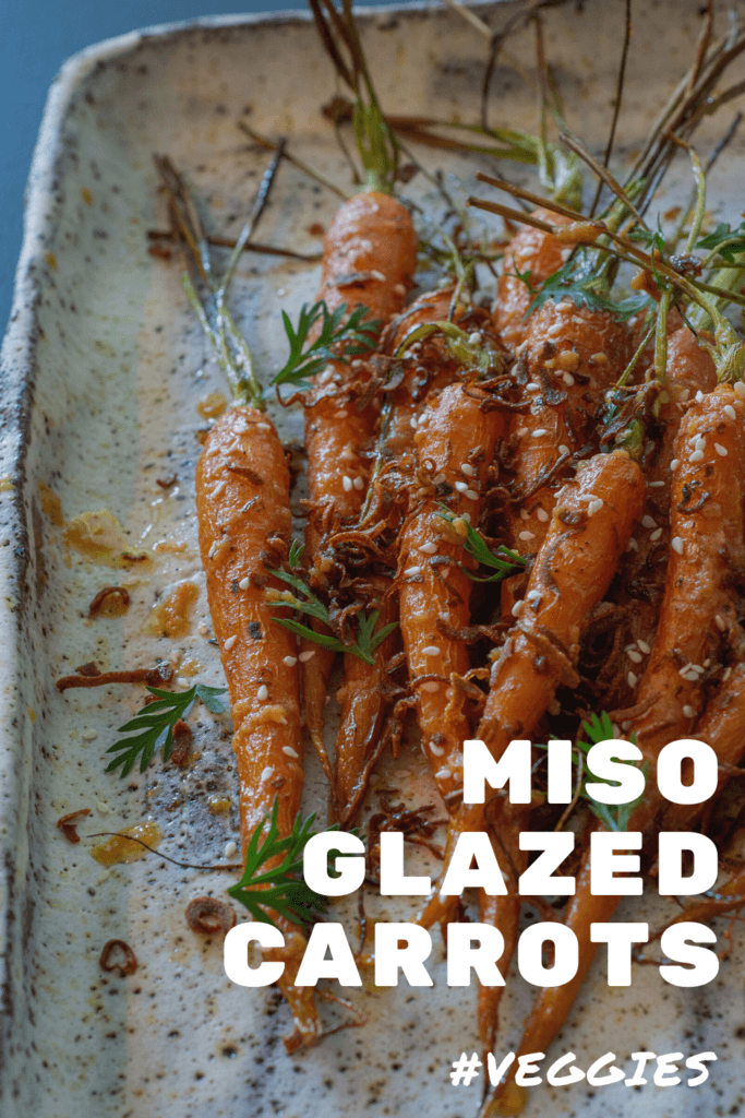 roasted miso maple carrots on a white serving plate