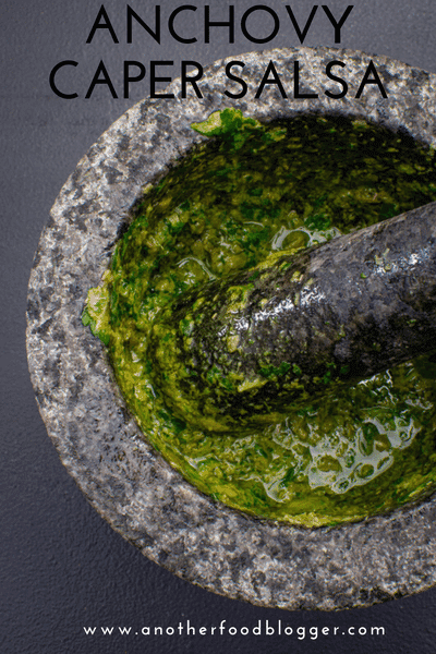 Anchovy steak sauce ingredients in a pestle & mortar