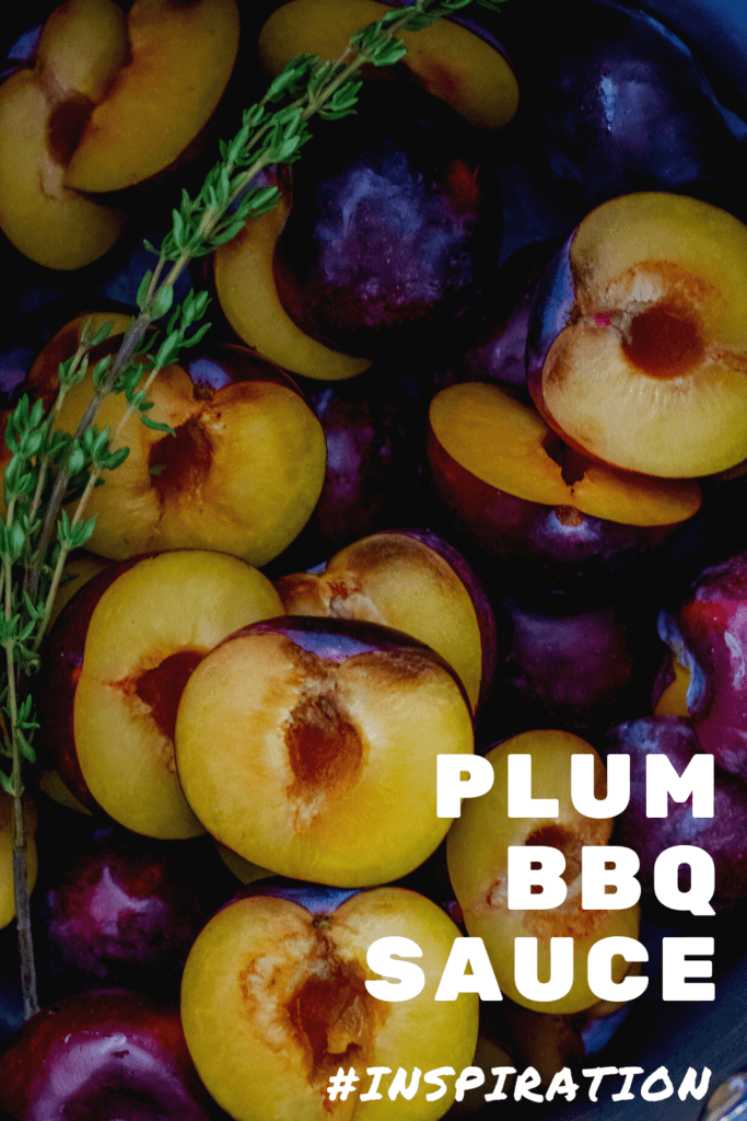 plums and thyme in a saucepan
