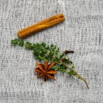 anise, clove, thyme & cinnamon on muslin cloth