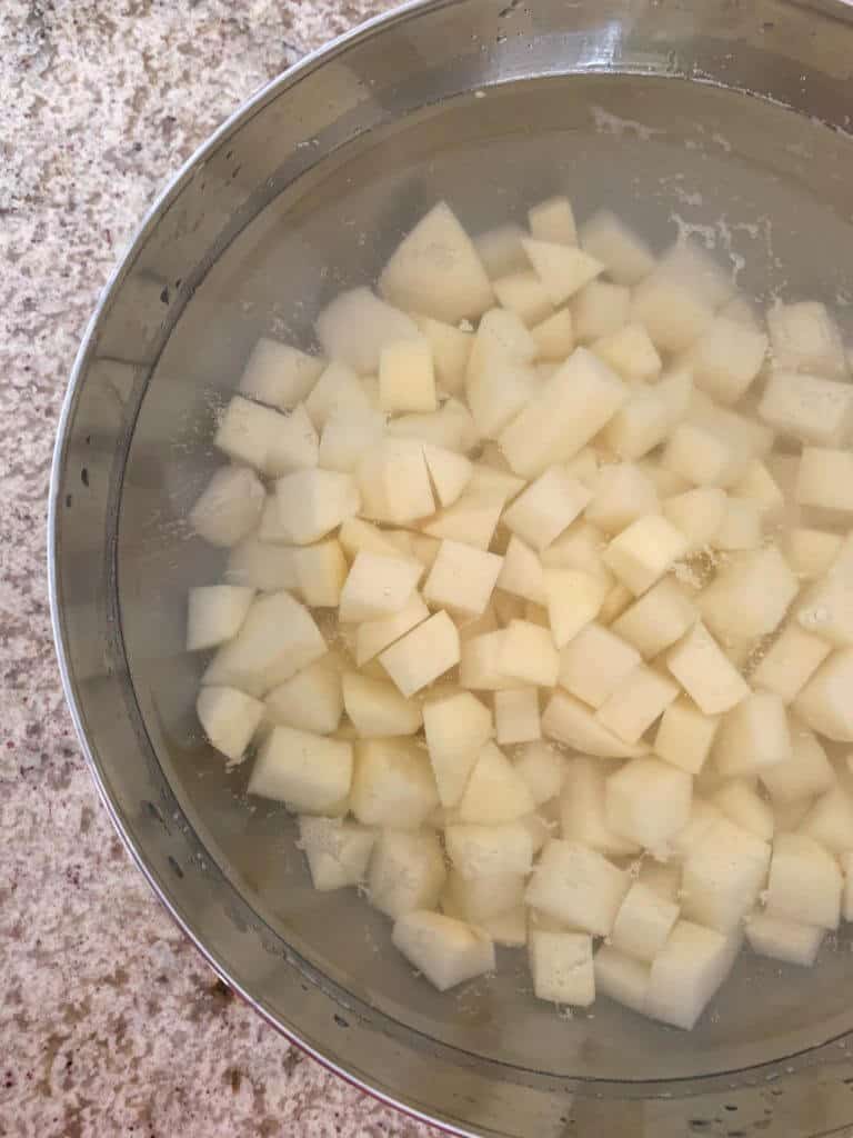 Peeled potatoes in water