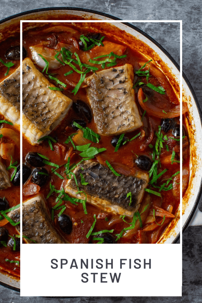 cooked spanish fish stew in casserole dish