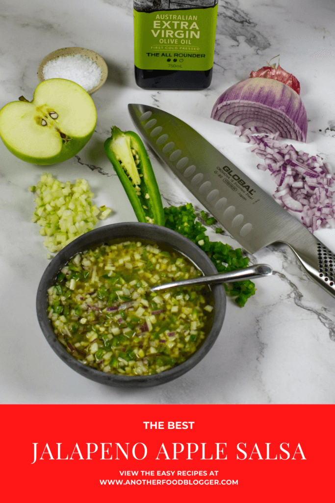olive oil, apple, jalapenos, global chef knife & salsa on counter top