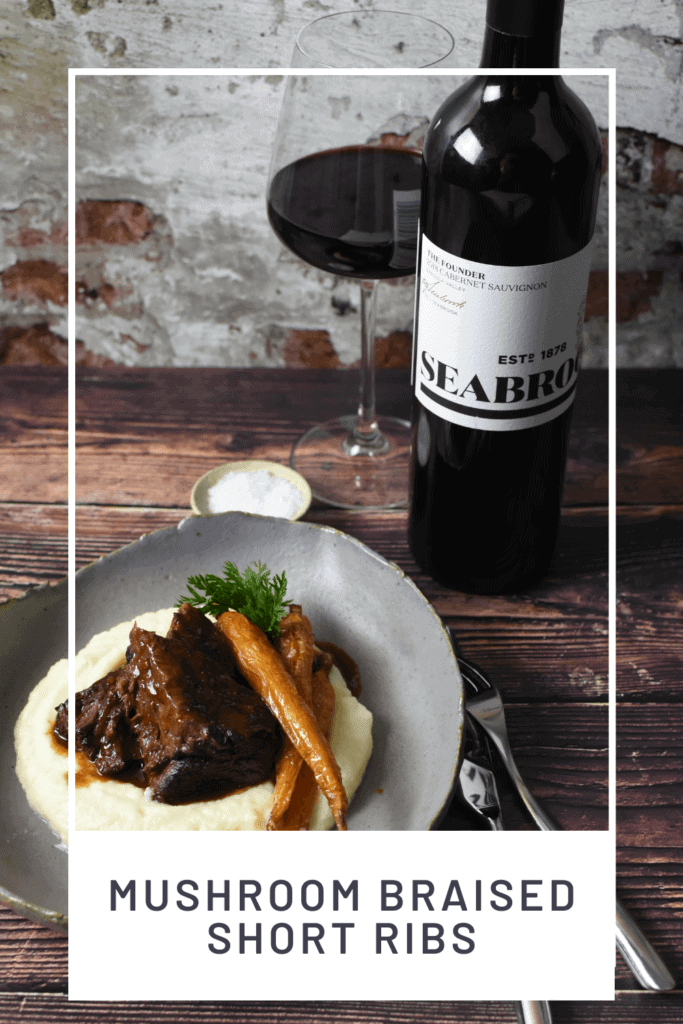 seabrook cabernet sauvignon, cutlery & bowl of mushroom braised short ribs