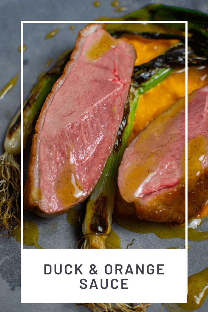 perfectly cooked duck breast, carrot puree & orange sauce on a made of australia plate