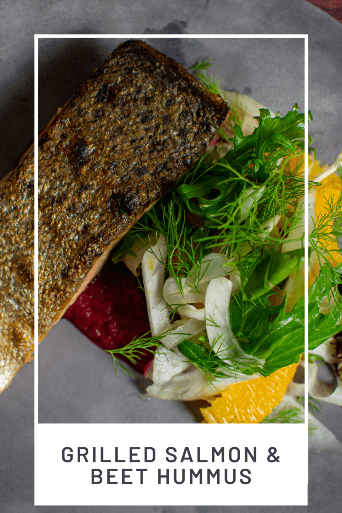 grilled salmon, beetroot hummus & fennel salad on a made of australia plate