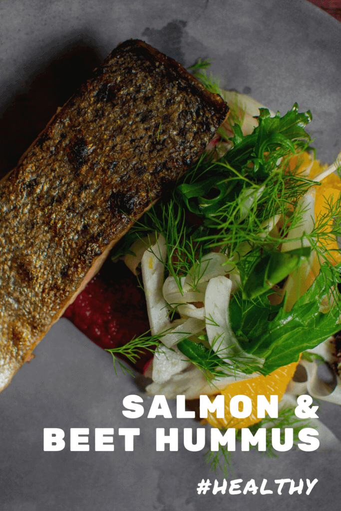 grilled salmon, beetroot hummus & fennel salad on a made of australia plate