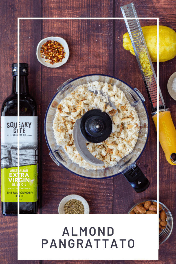 breadcrumbs, almonds, squeaky gate olive oil & lemon on a wooden table