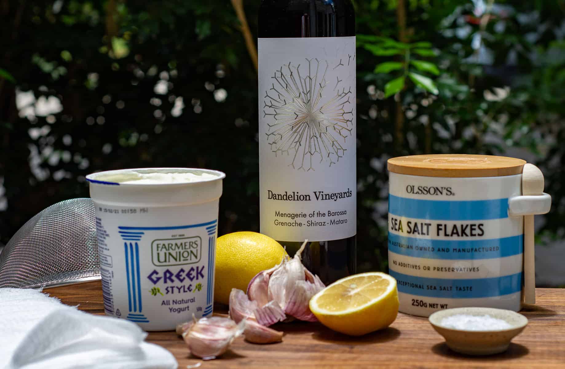 labneh ingredients and a bottle of dandelion GSM wine