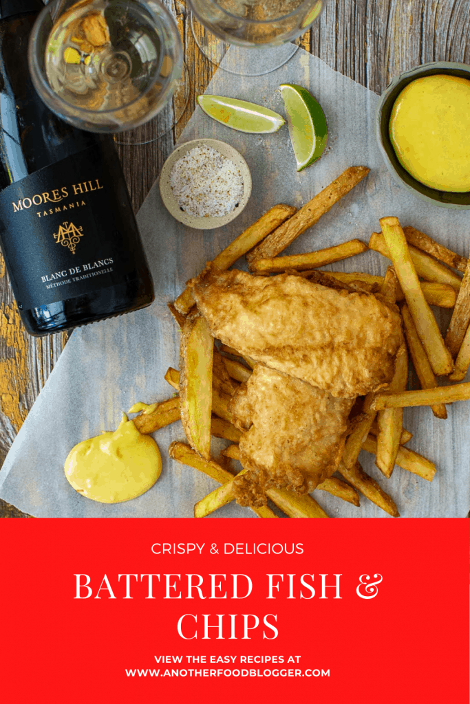 battered fish & chips, aioli, moores hill blanc de blanc wine & salt on a wooden table