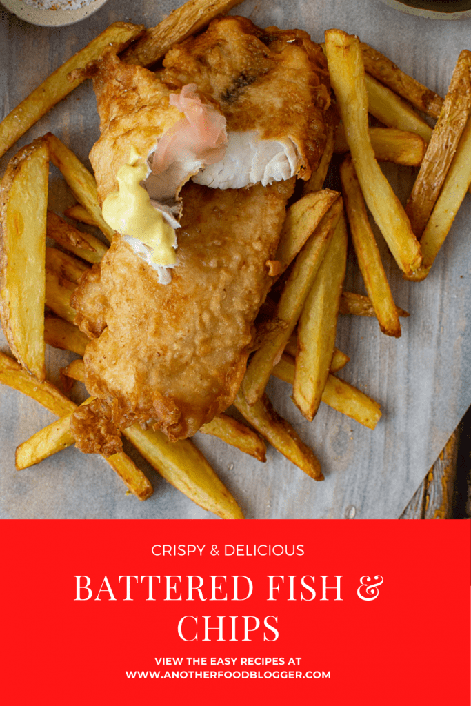battered fish & chips & pickled ginger on a wooden table