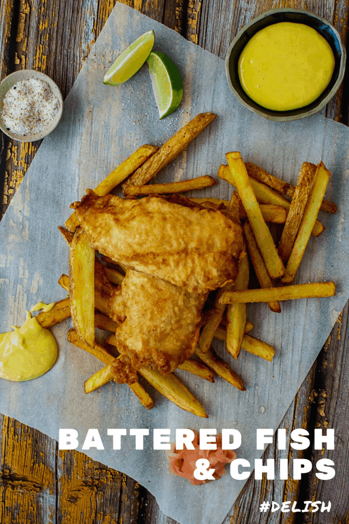 battered fish & chips, aioli & salt on a wooden table