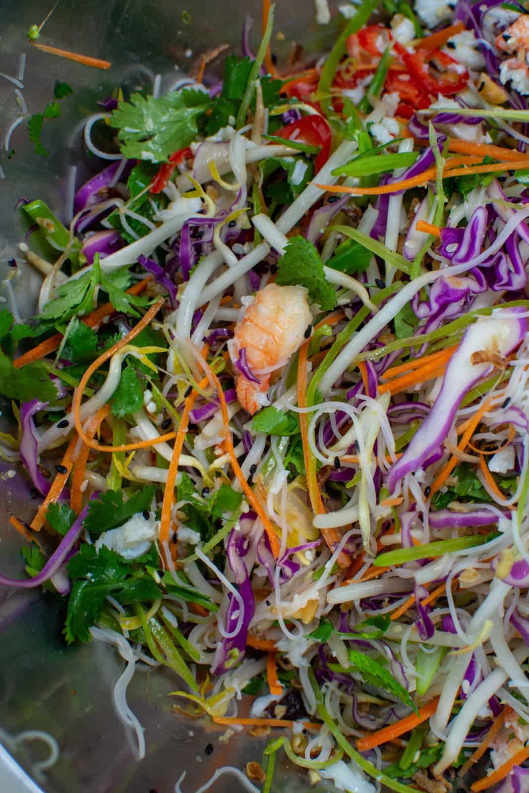 asian crab salad ingredients in a mixing bowl