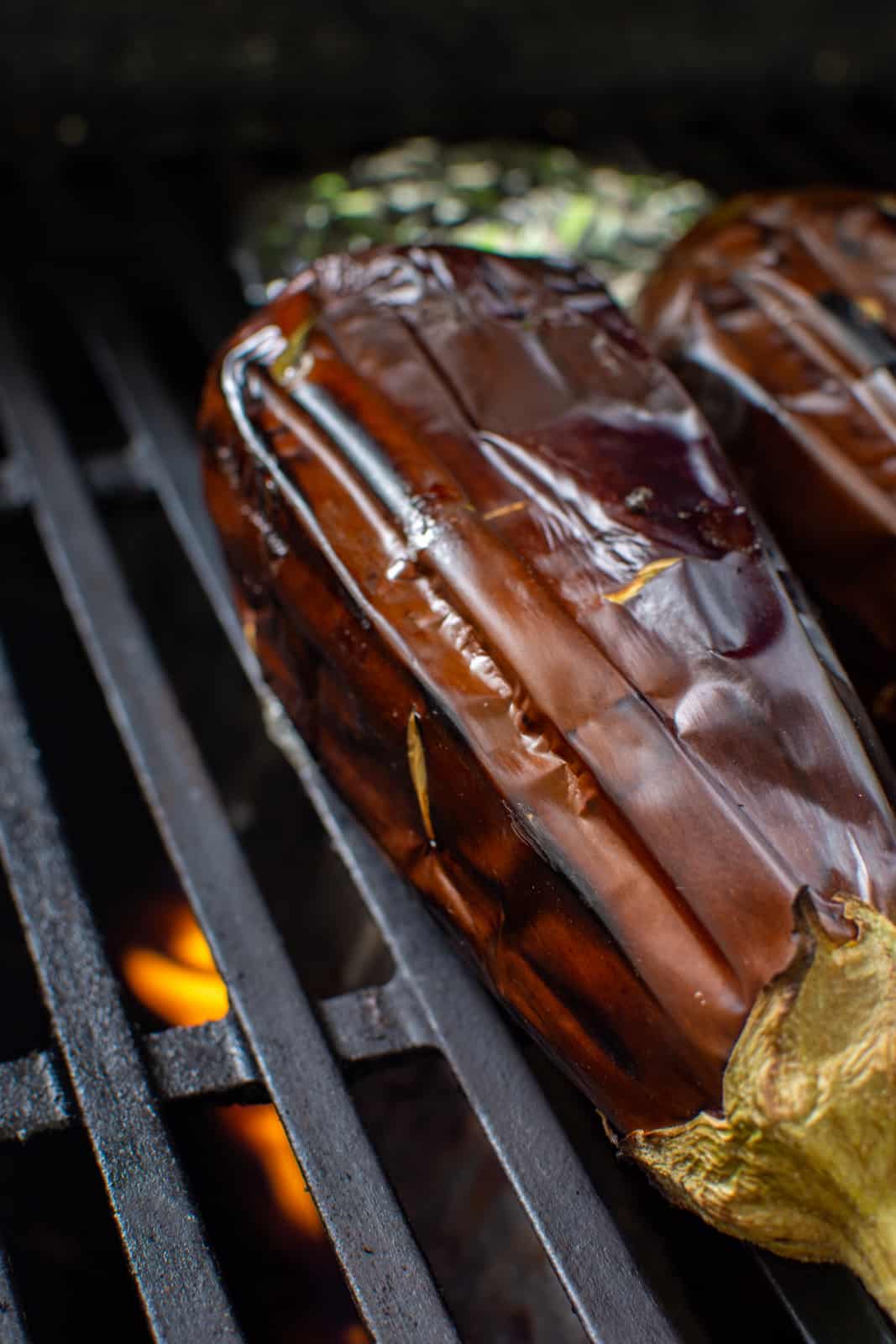 eggplants smoking on the bbq for baba ghanoush
