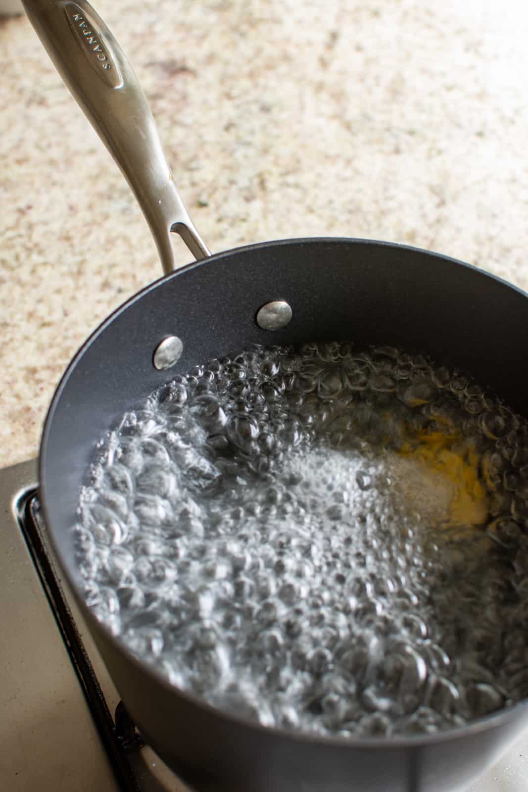 eggs boiling in a saucepan