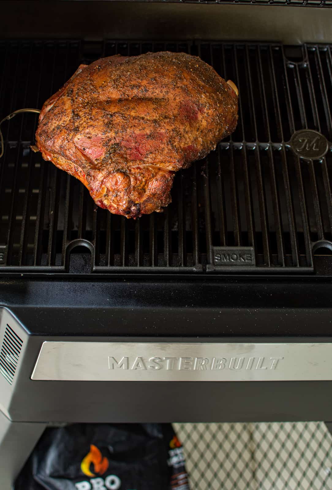 smoked lamb shoulder on a masterbuilt barbecue