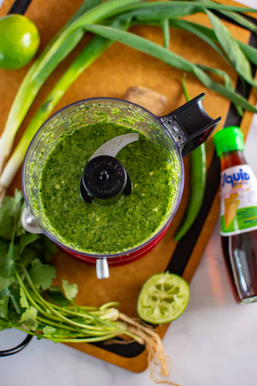 nam prik dressing and ingredients in a blender