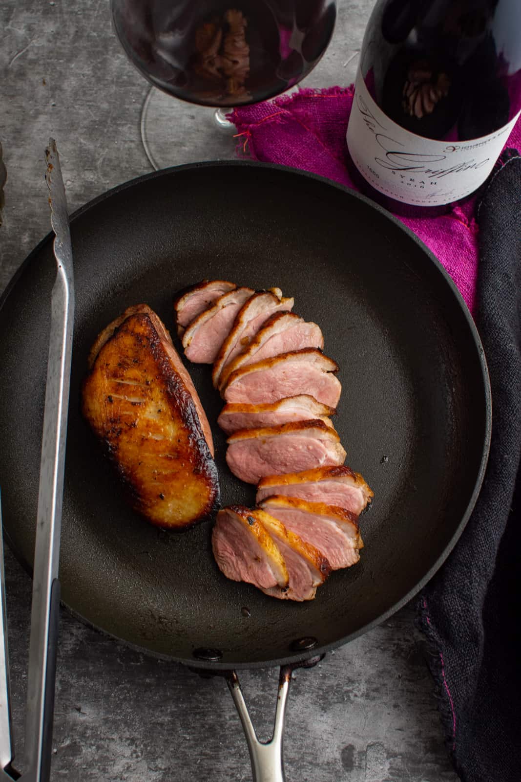 perfectly cooked duck breast in frying pan 