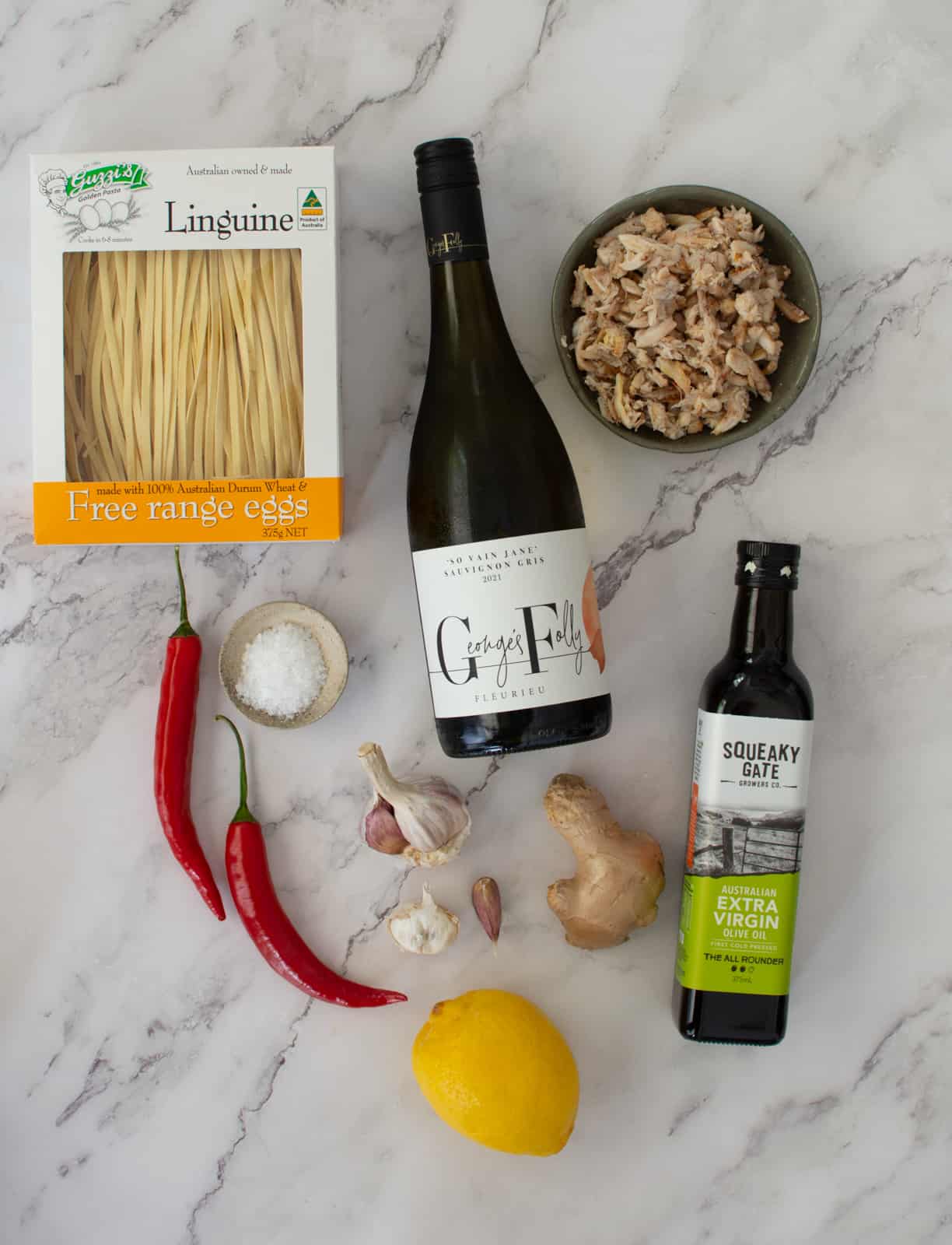 Ingredients to make chilli crab pasta on kitchen counter top