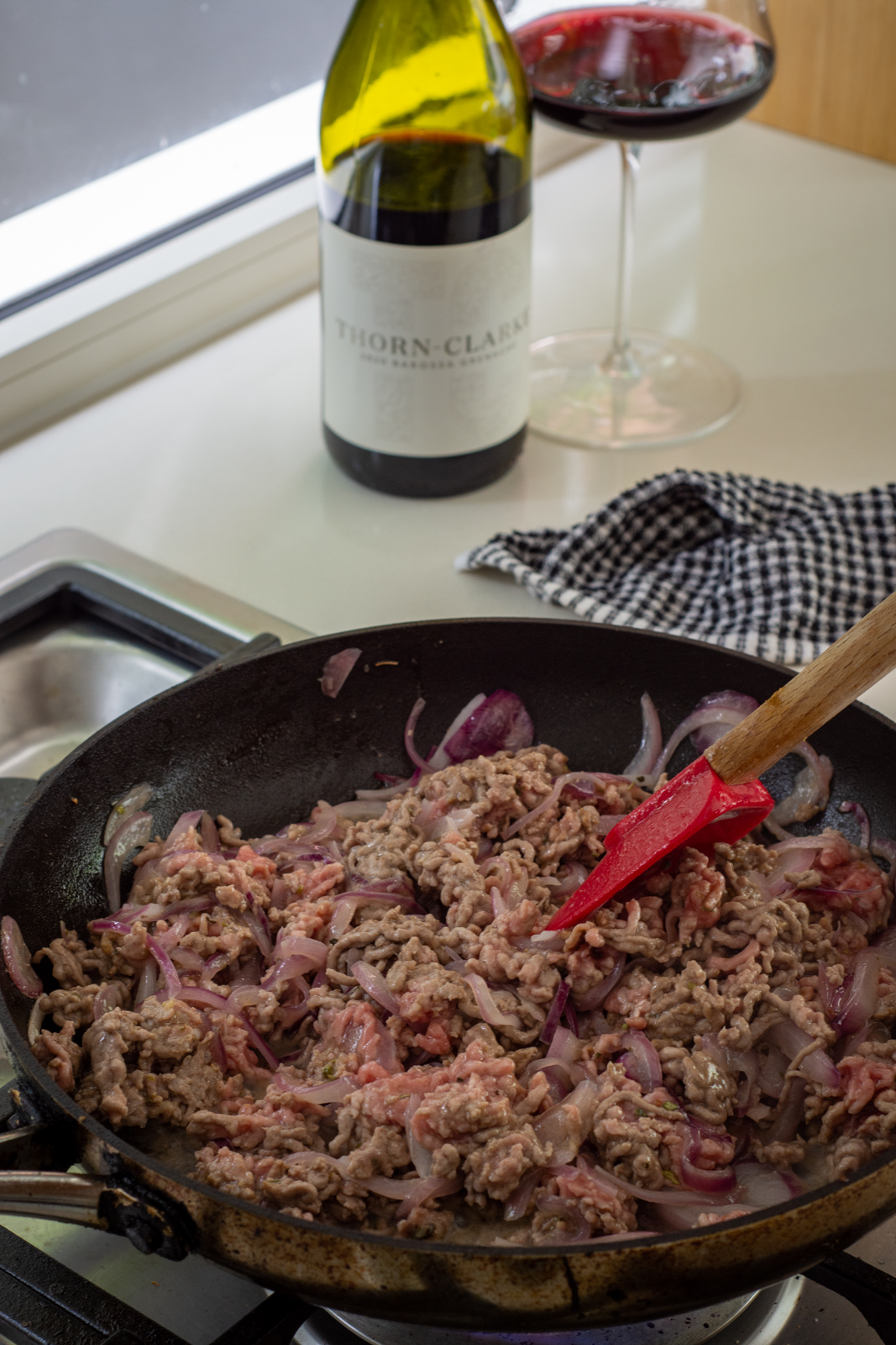 cooking lamb mince in a frying pan