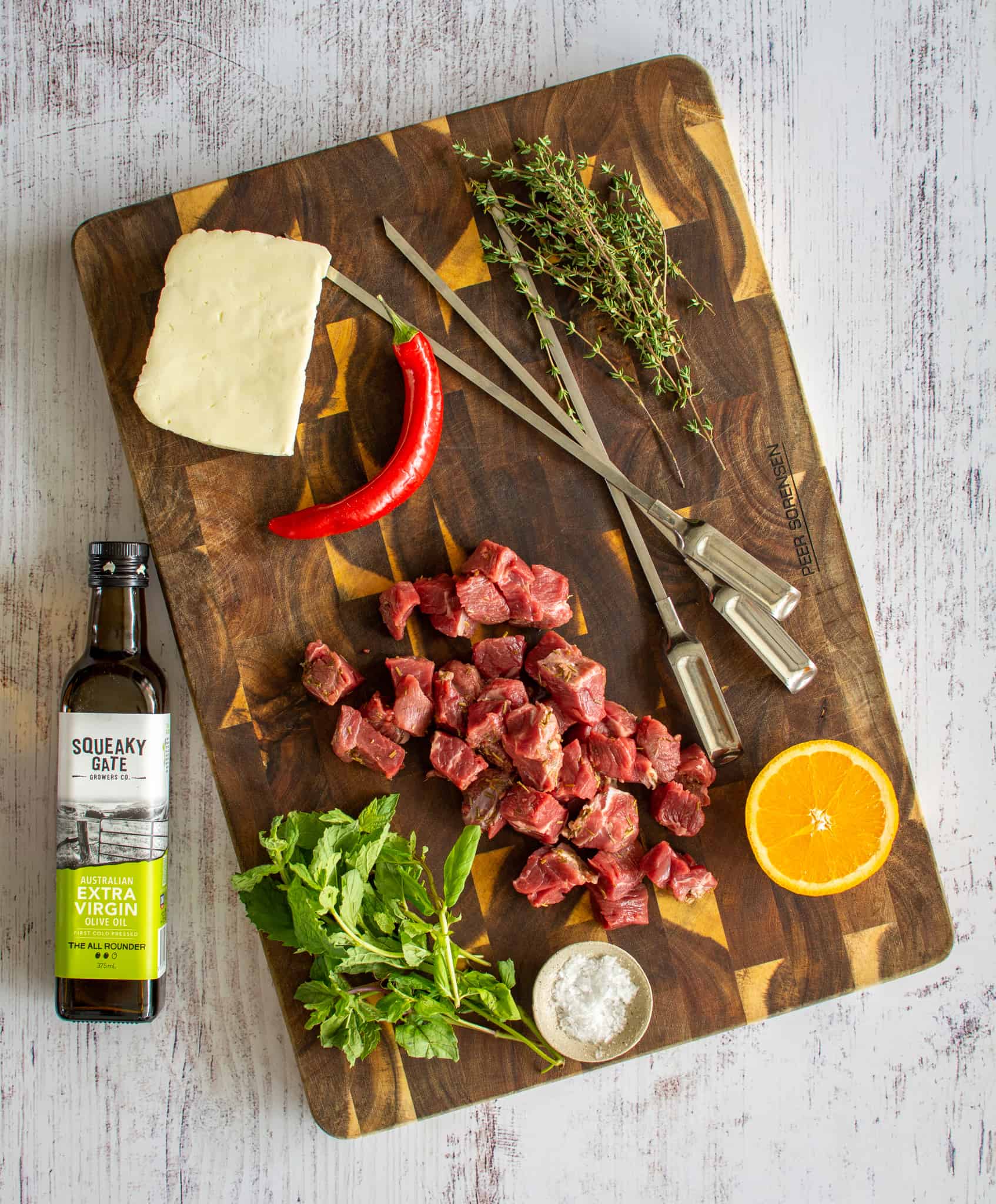 Birdseye view of ingredients for grilled lamb skewers