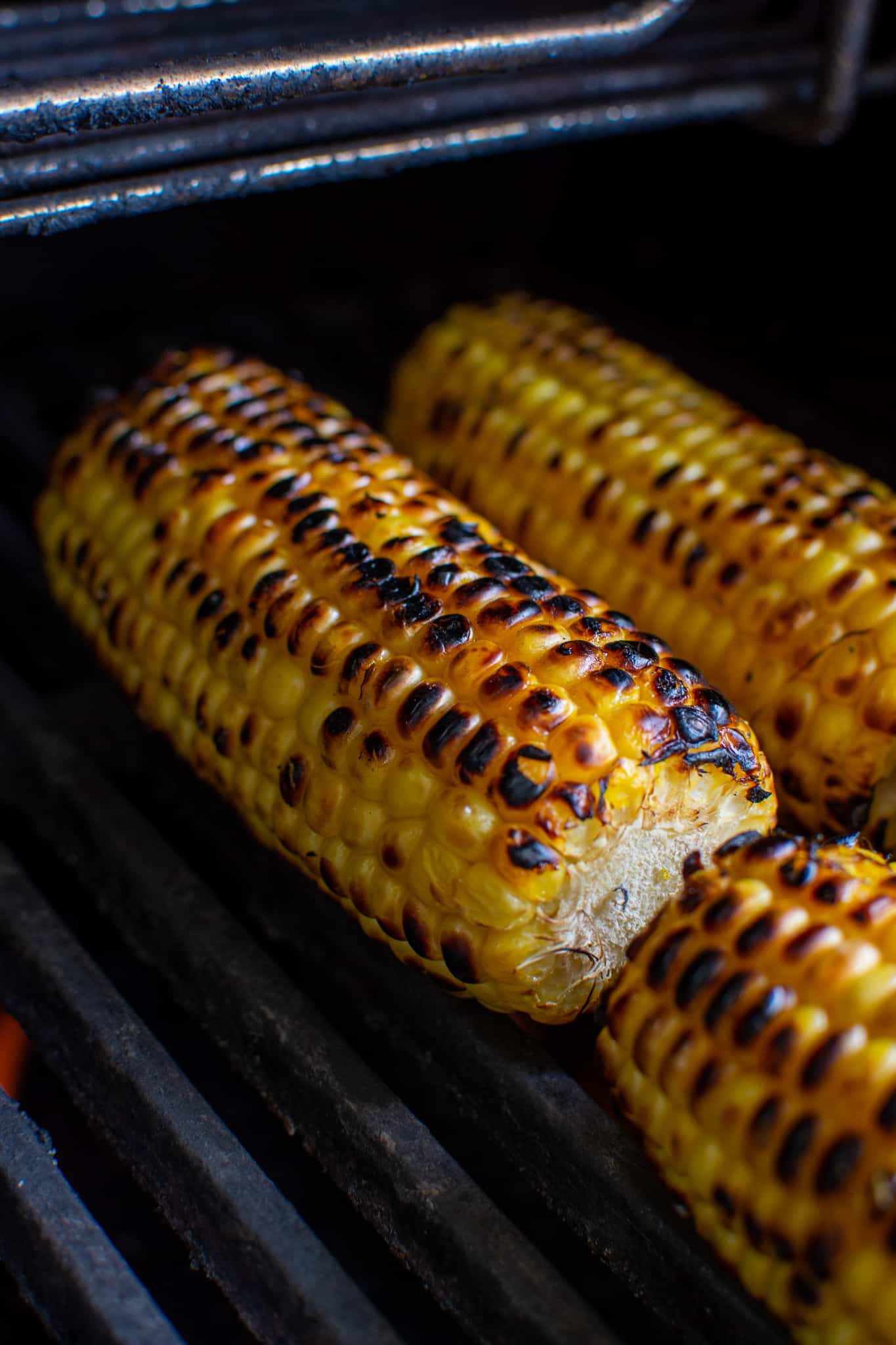 corn being charred on the BBQ